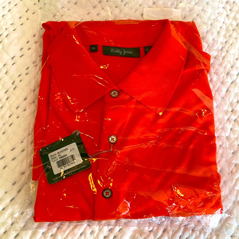 Brand new microfiber long sleeve polo in bright orange